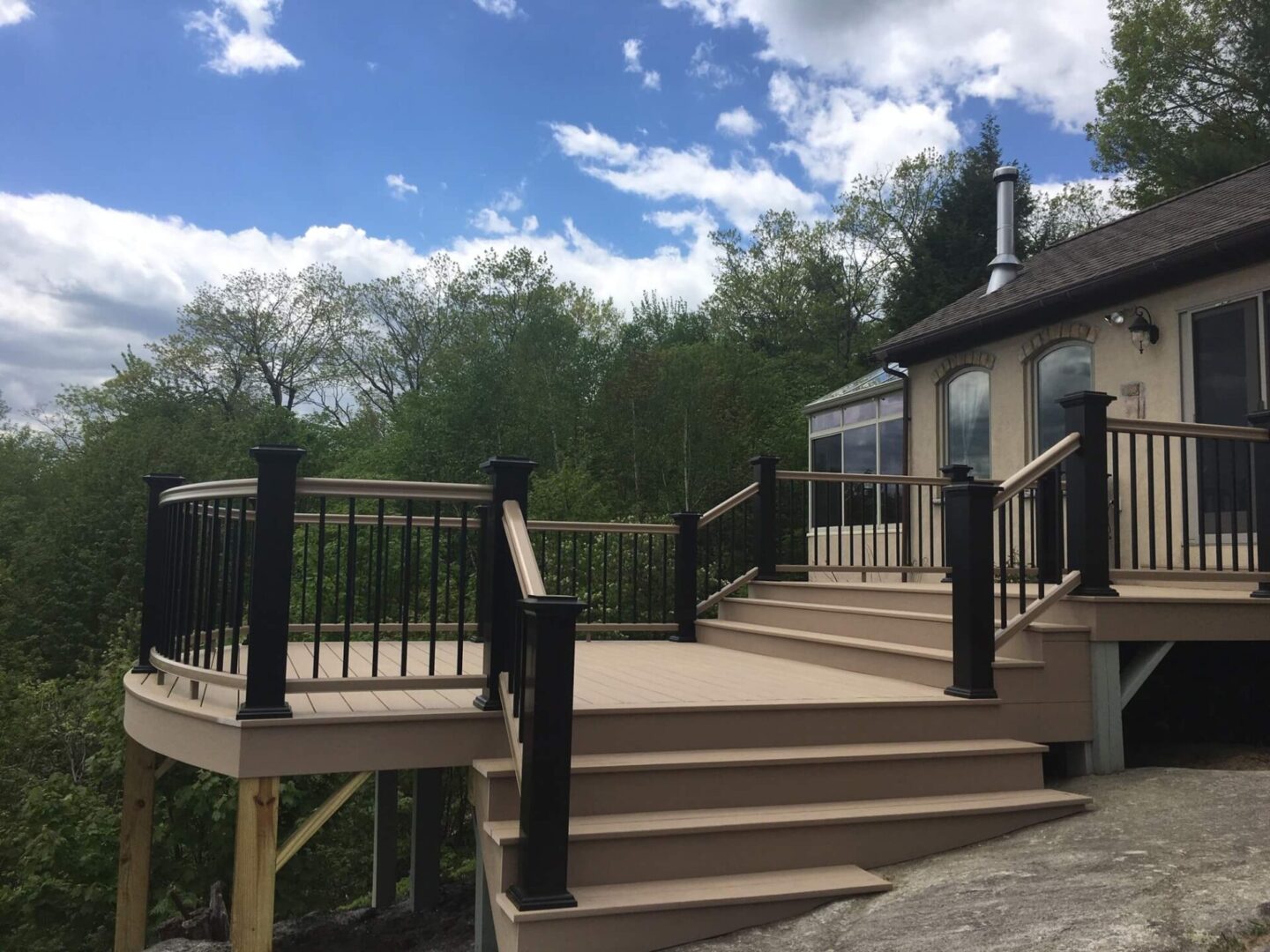 Outdoor deck and stairs of a one-story home